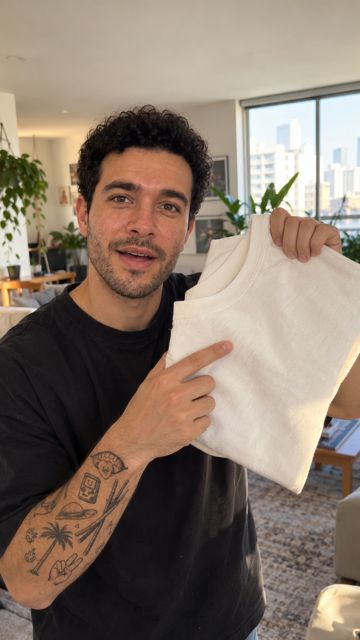 Jake showing a t-shirt